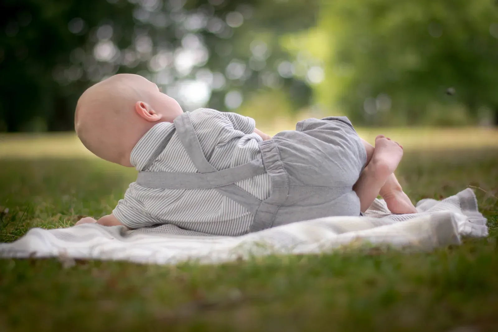 Baby photographed outdoors on a family session in the Lancashire countryside