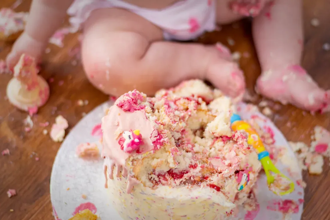 Smashed first-birthday cake at a Lancashire cake smash photography session
